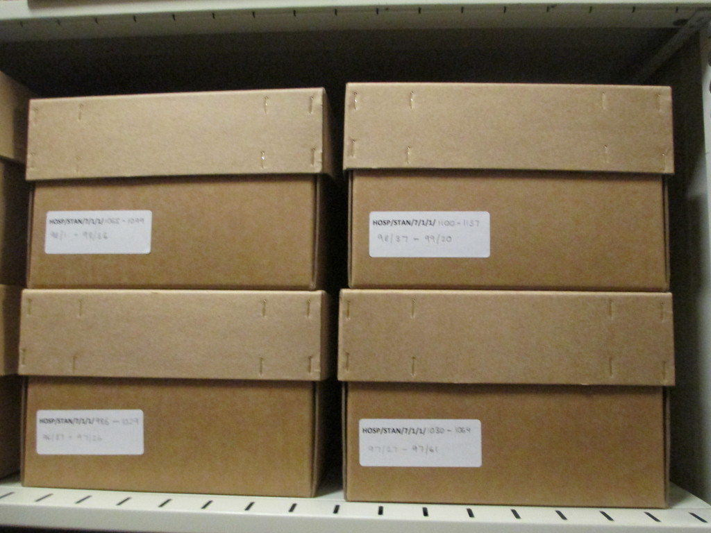 Repackaged boxes of files at their new permanent location